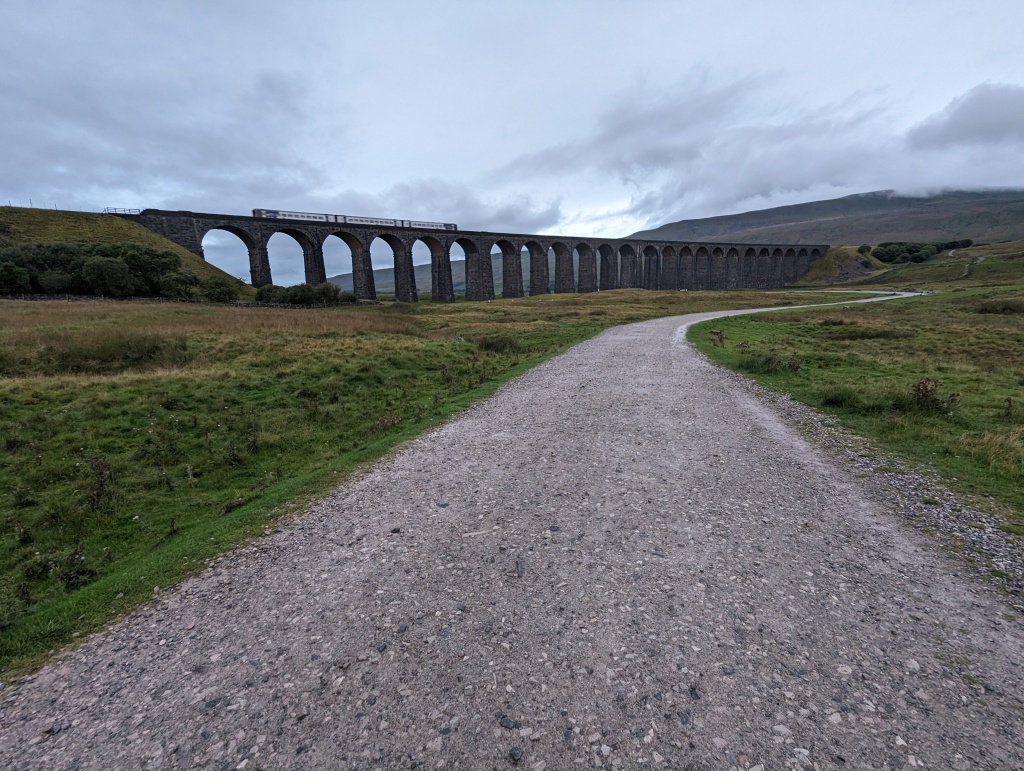 Train crossing Ribblehead viaduct on the Settle to Carlisle line